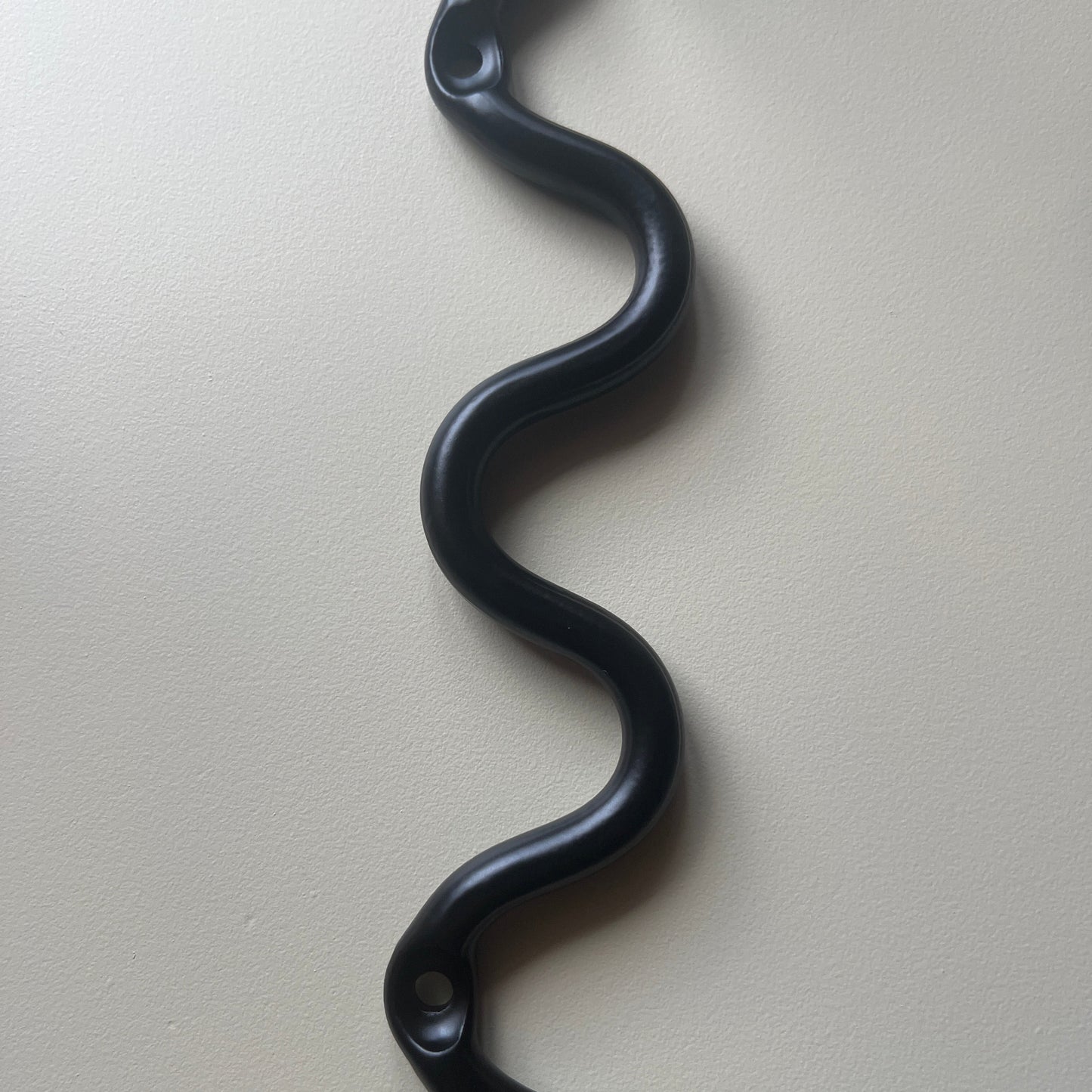 The Meander Hook-Iron