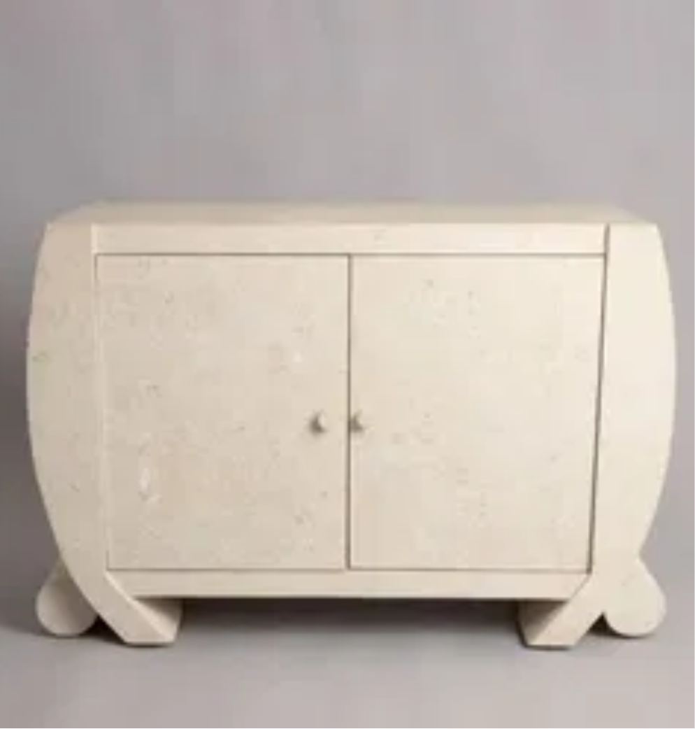 White wooden cabinet with curved design on a gray background