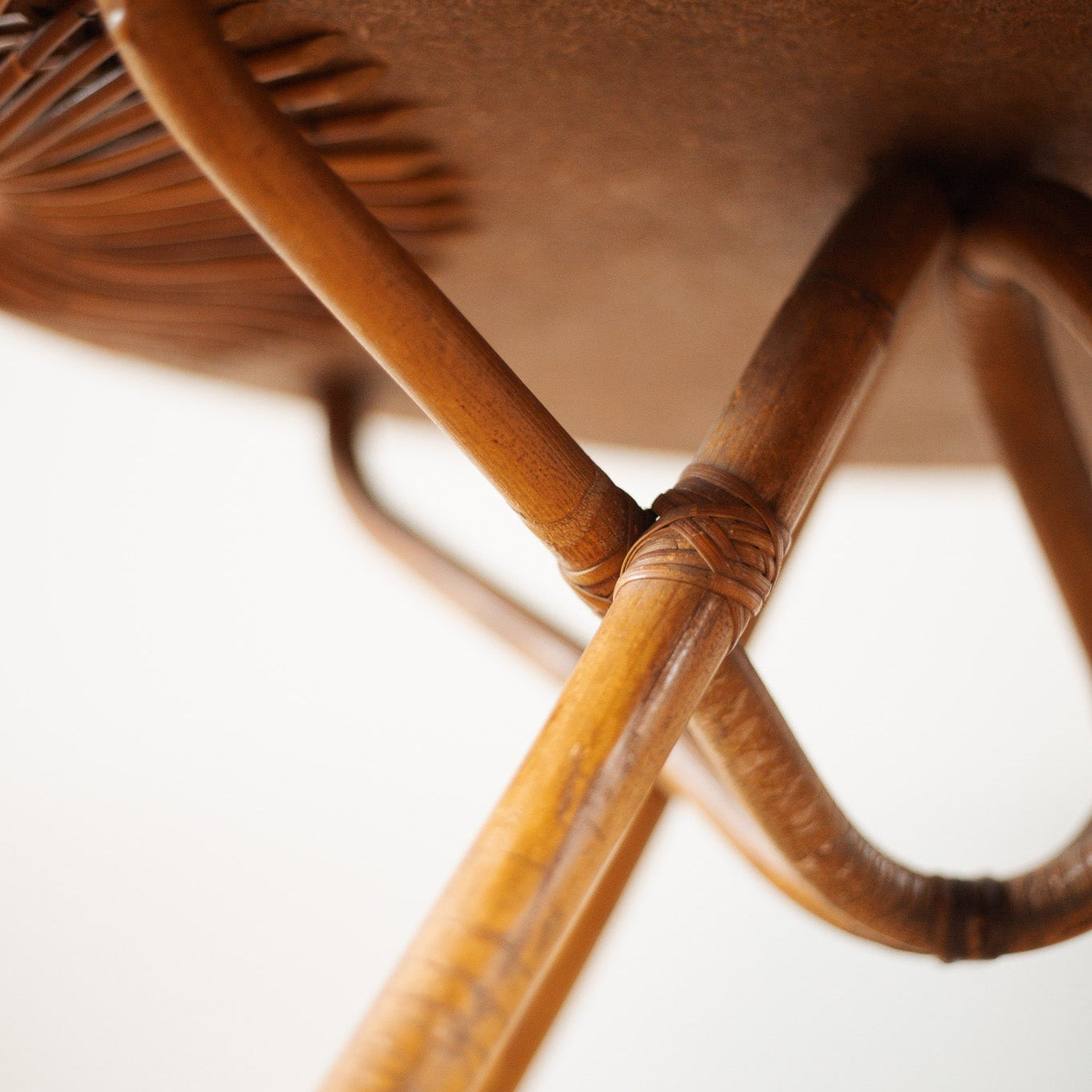 brown bamboo table on a neutral background