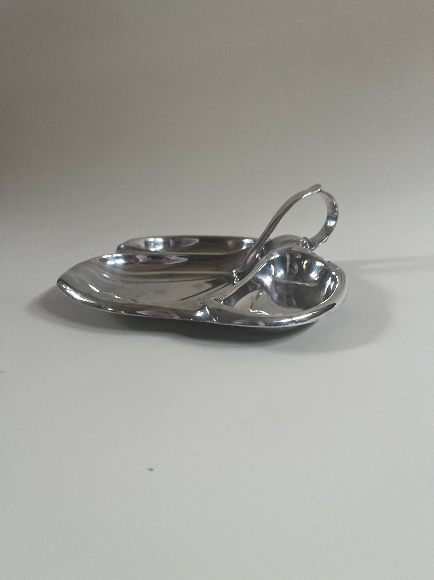 silver plate mappin and webb vintage serving dish with handle on light grey background