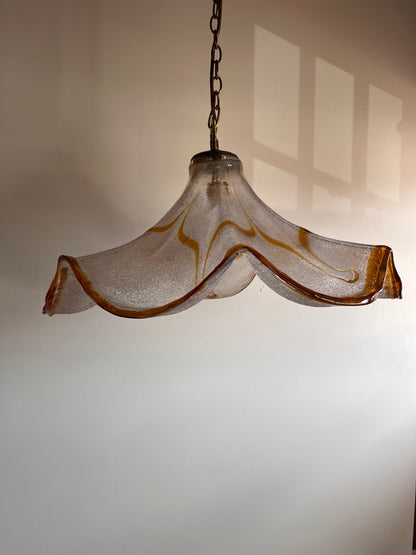 Large Murano glass pendant light with amber graniglia texture and wavy silhouette, circa 1970