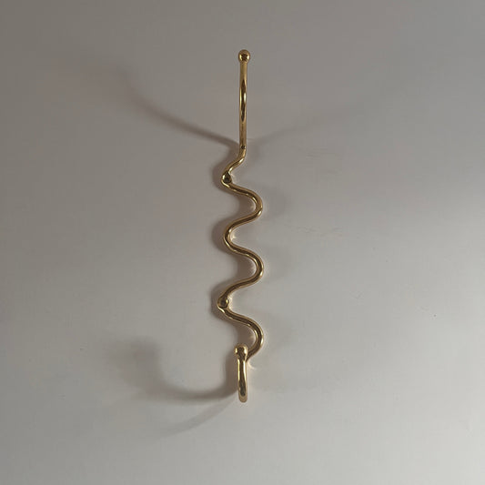 Wiggle hook in solid brass similar to a squiggle hook or curvature hook 