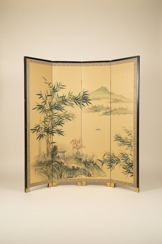 A three-panel folding screen with a black frame and a beige background, decorated with a traditional Japanese landscape painting featuring bamboo, mountains, and water.