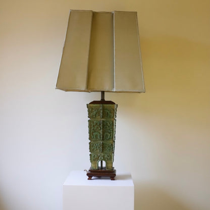 Chinese bronze table lamp with a neutral background