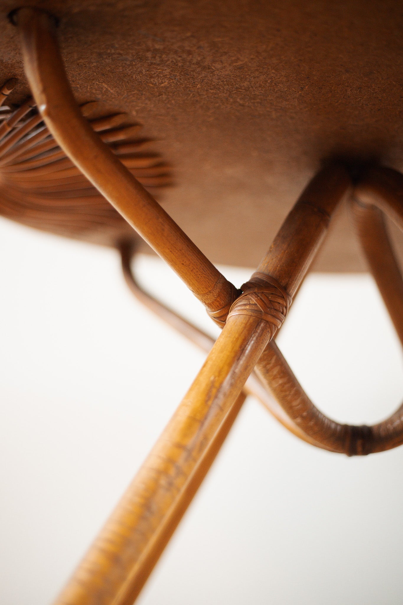 brown bamboo table on a neutral background