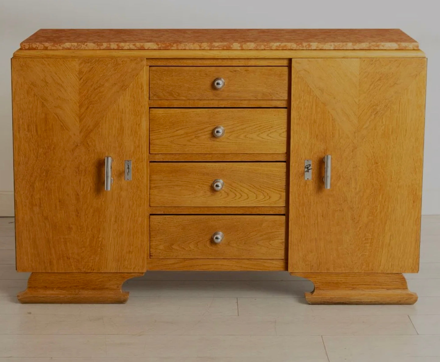 French Art Deco oak sideboard with solid marble top and chevron veneers, circa 1940