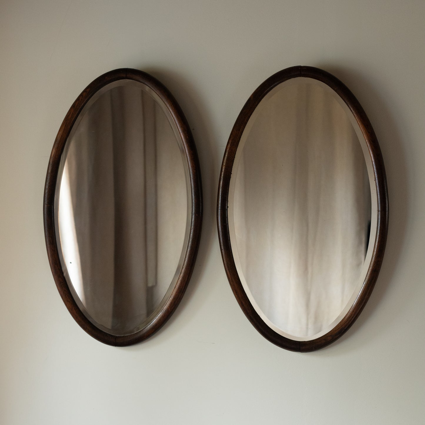 Pair of  Oval Oak Mirrors c. 1910