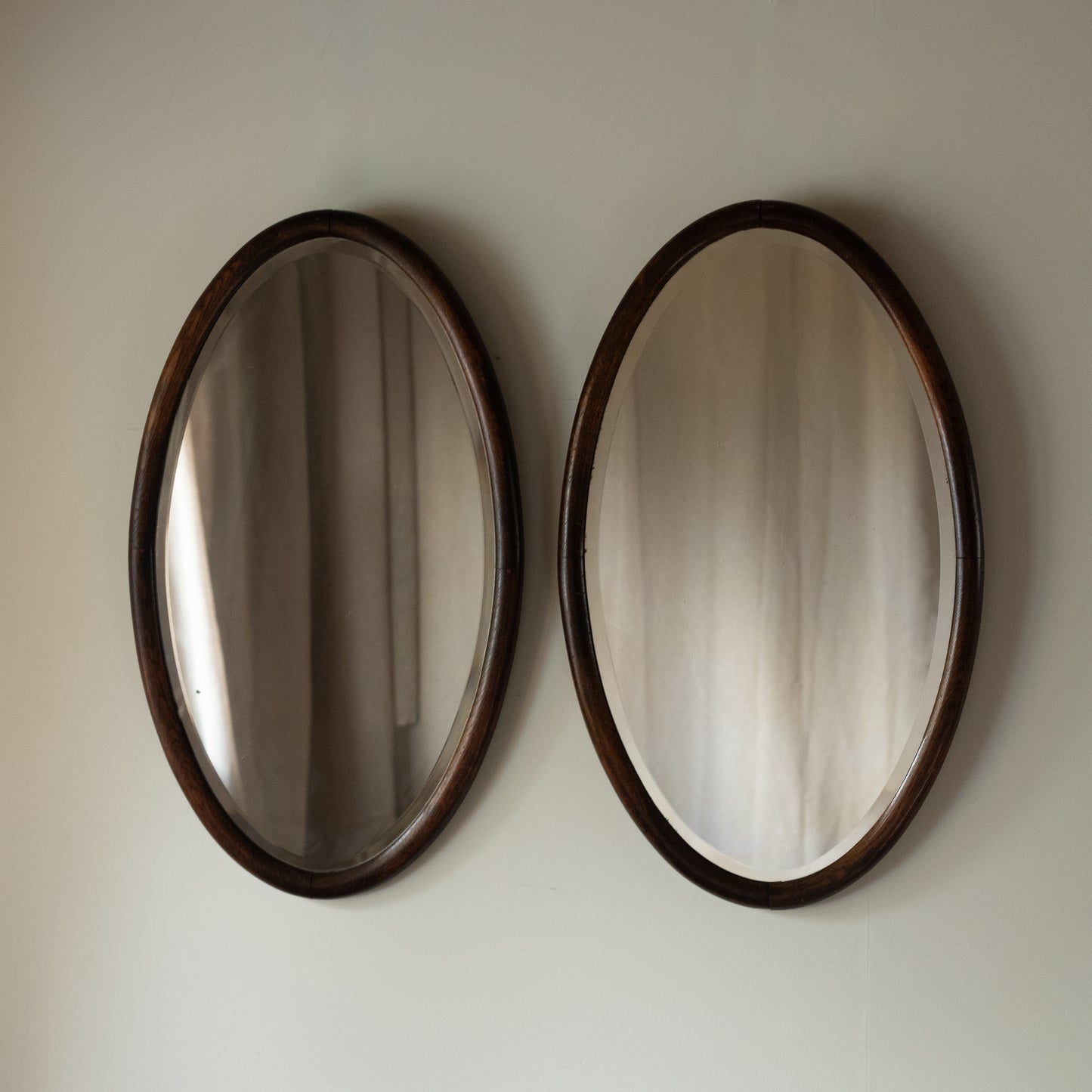 Pair of  Oval Oak Mirrors c. 1910