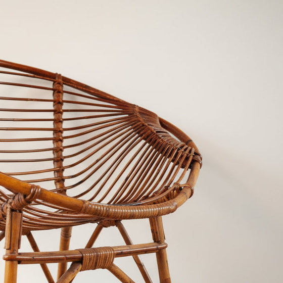 Wicker chair with a plain background