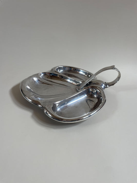 Silver dish serving plate on light grey background