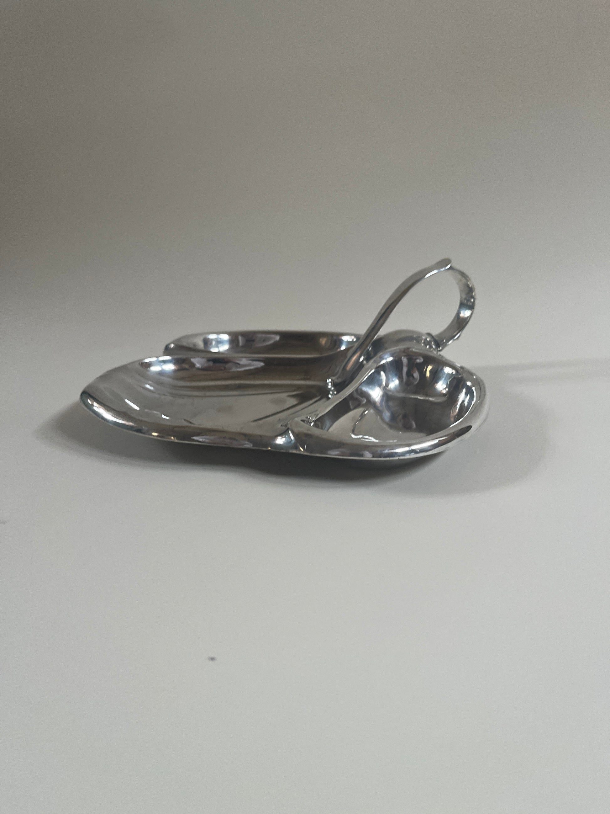 silver plate mappin and webb vintage serving dish with handle on light grey background