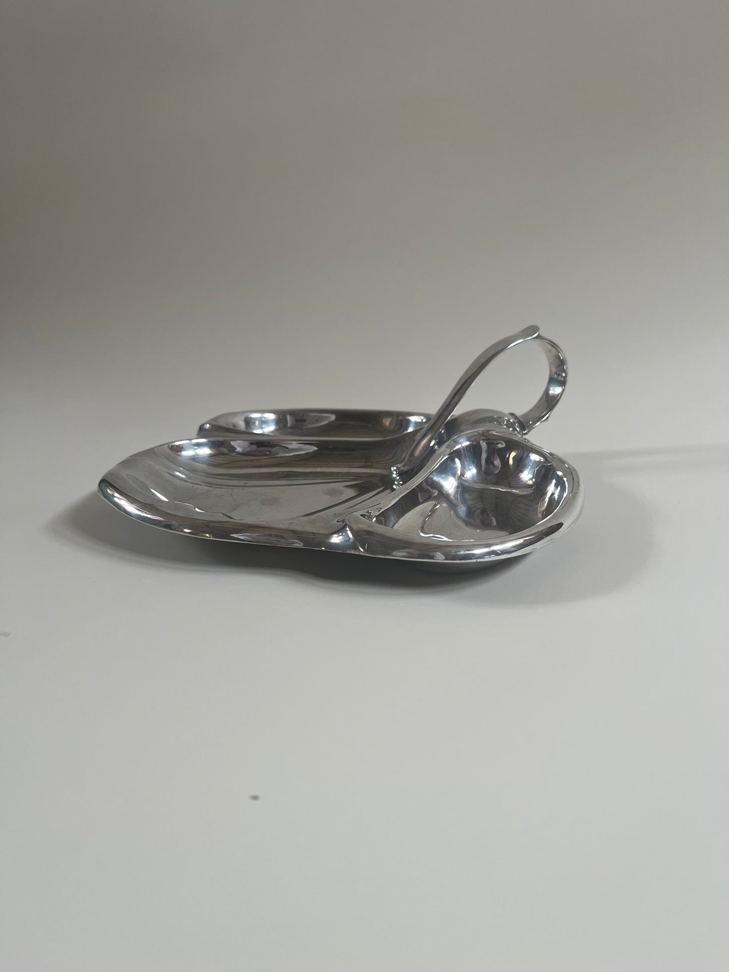 silver plate mappin and webb vintage serving dish with handle on light grey background