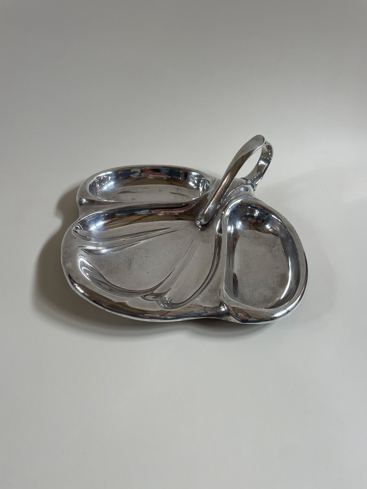 silver plate mappin and webb vintage serving dish with handle on light grey background