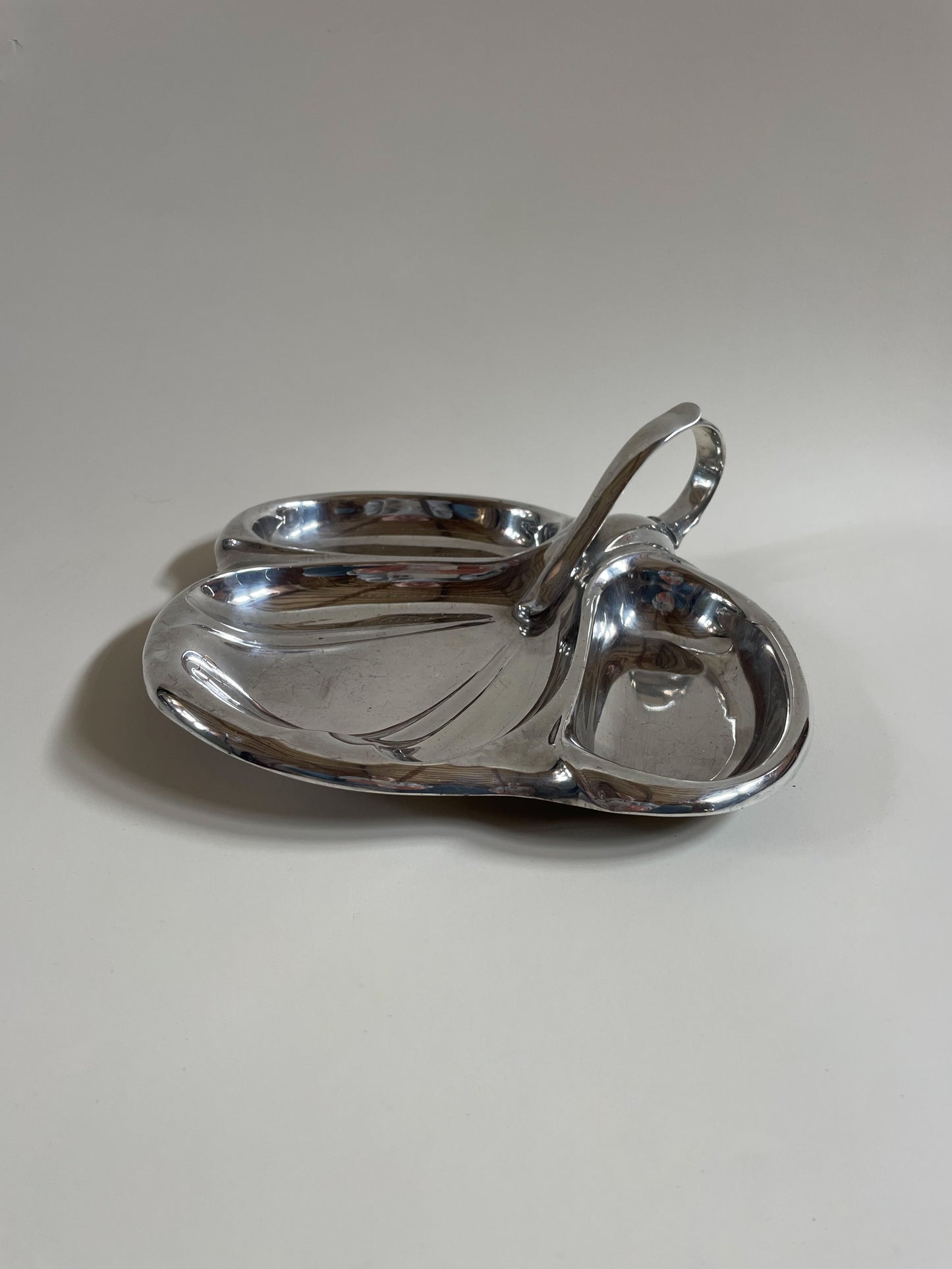silver plate mappin and webb vintage serving dish with handle on light grey background