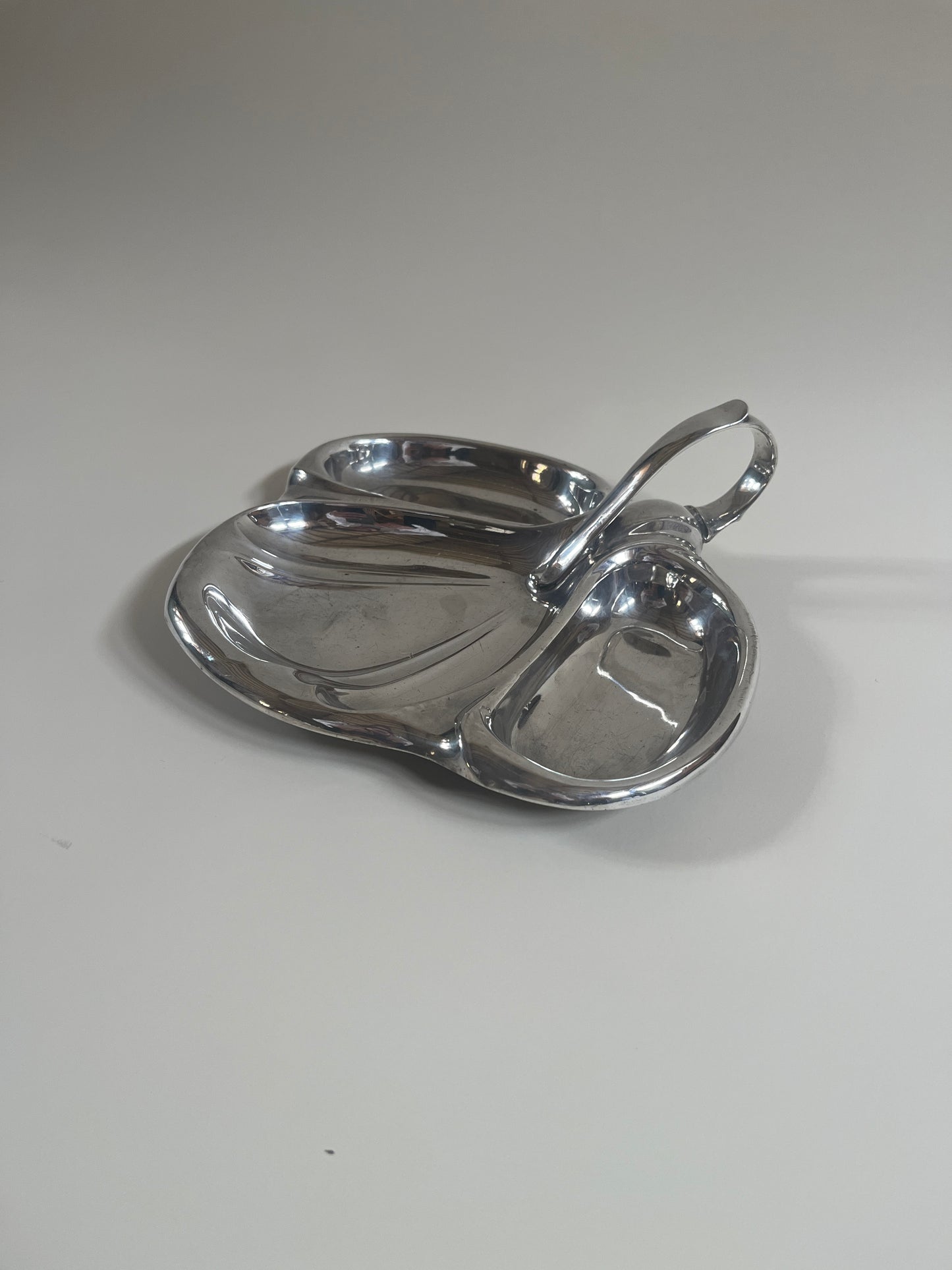 silver plate mappin and webb vintage serving dish with handle on light grey background