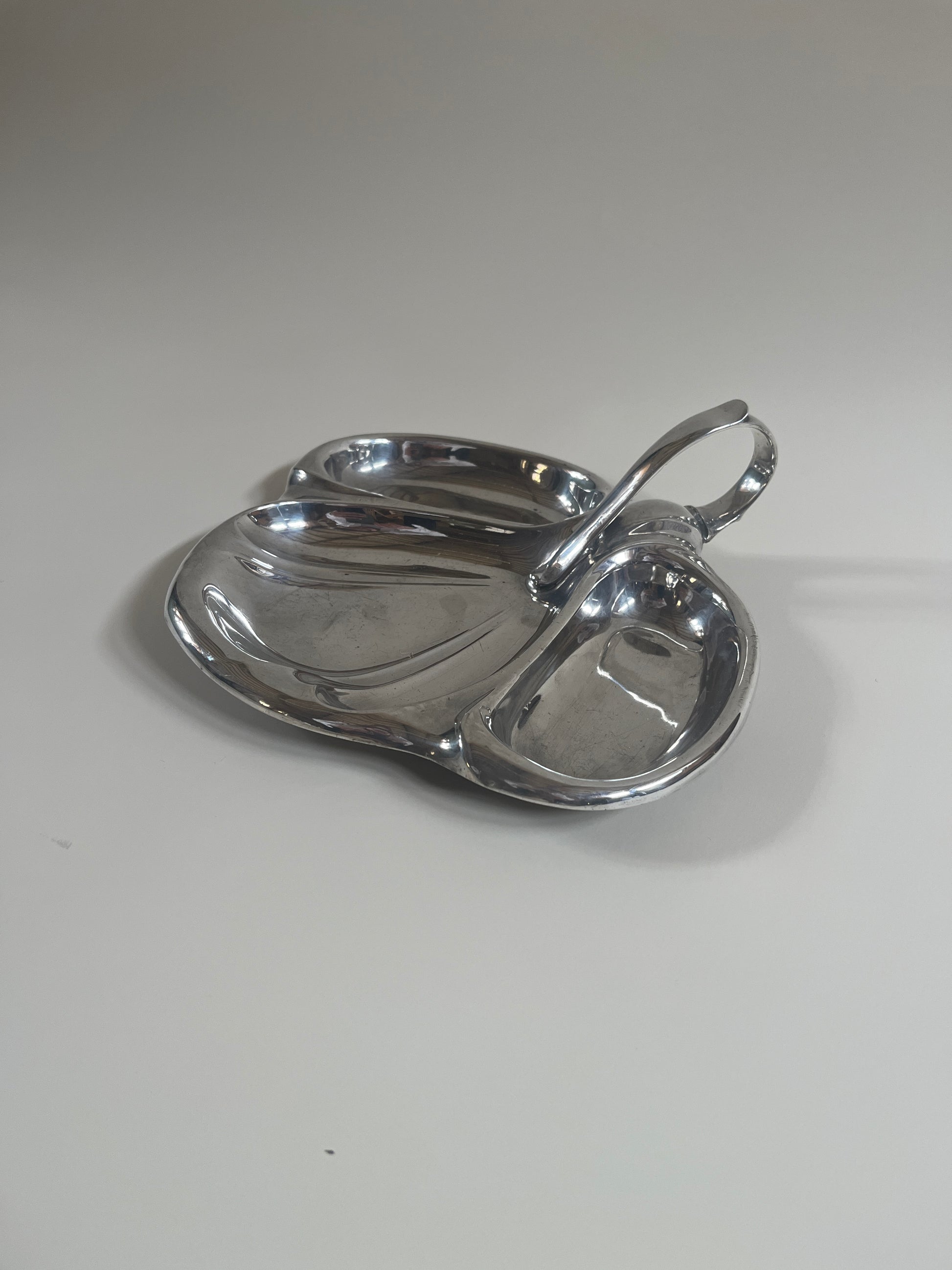 silver plate mappin and webb vintage serving dish with handle on light grey background
